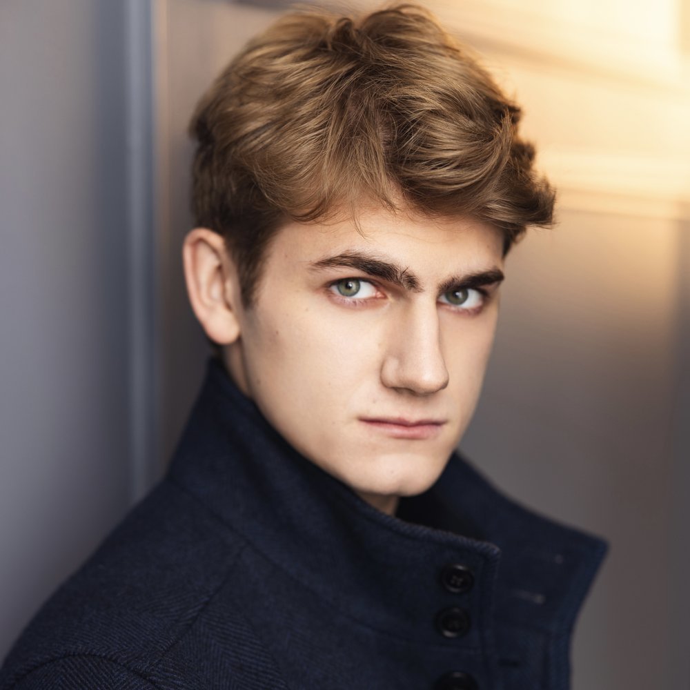 Standa Vecera editorial portrait in navy coat